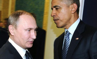 Vladimir Poutine (g) et Barack Obama lors de la COP21 à Paris, le 30 novembre 2015