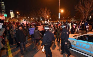 Des manifestants protestent contre les violences policières, le 4 décembre 2014 à New York