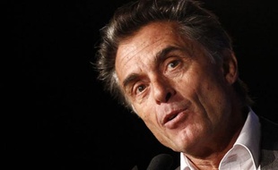 French TV host Gerard Holtz speaks during a news conference about the 2012 Argentina-Chile-Peru Dakar rally in Paris November 8, 2011. The Dakar 2012 rally will start on January 1st from Mar Del Plata in Argentina to January 15th at Lima in Peru. REUTERS/Jacky Naegelen (FRANCE - Tags: SPORT MOTORSPORT MEDIA HEADSHOT)