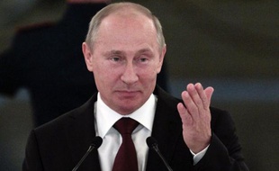 Russian President Vladimir Putin speaks at an awards ceremony for Russia's Olympians in Moscow's Kremlin in Moscow's Kremlin on August 15, 2012. AFP PHOTO / POOL / MAXIM SHEMETOV