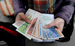 Illustration de billets en francs, ici en 2012.