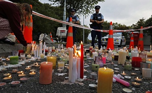 Le 18 mars 2019,des bougies en mémoire des victimes de Christchurch. AP Photo/Vincent Yu