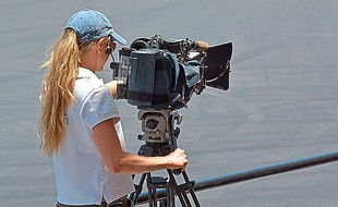 Mandatory Credit: Photo by Chameleons Eye/REX (4283714g)
Camerawoman filming.
Various
/Rex_Various_4283714G//1412091433