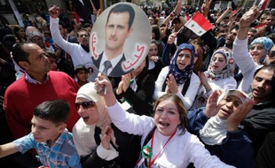 Manifestation pro-Assad à Damas le 16 mars 2014