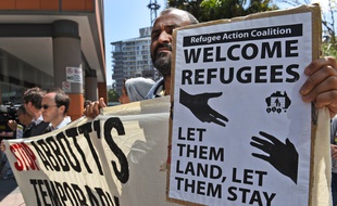 Un manifestant lors d'un rassemblement contre la politique d'immigration australienne, à Sydney, le 26 septembre 2014.