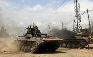 L'armée syrienne a affirmé dimanche contrôler le coeur de Qousseir, longtemps place forte des rebelles dans le centre du pays, au lendemain de déclarations du président Bachar-al-Assad martelant sa détermination à rester au pouvoir.