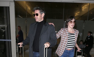 Le réalisateur Paul W. S. Anderson et sa femme, l'actrice Milla Jovovich à l'aéroport de Los Angeles (LAX)