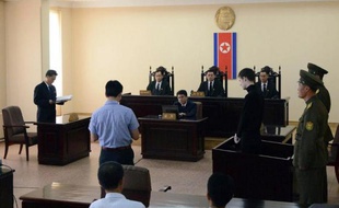 Photo fournie par l'agence officielle nord-coréenne Kcna le 14 septembre 2014 de l'Américain Matthew Miller condamné par un tribunal à Pyongyang à six ans de camp de travail