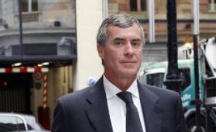 L'ex-ministre du Budget Jérôme Cahuzac arrive au pôle financier de Paris, le 11 septembre 2013