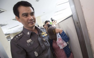 Paitoon Haabunmee, une mère porteuse interrogée dans le cadre de l'enquête sur l'«usine à bébés» mise sur pied par un Japonais, le 25 août 2014, à Bangkok, en Thaïlande.