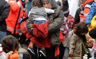 Des familles de migrants à leur arrivée le 6 septembre 2015 à la gare de Munich en Allemagne