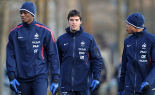 Yoann Gourcuff (au centre) et Abou Diaby (à gauche) en février 2011.
