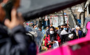 Des Iraniens à Téhéran, le 21 février 2021.