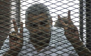 Le journaliste Egypto-Canadien d'Al-Jazeera Mohamed Fahmy, le 23 juin 2014 lors de son procès au Caire