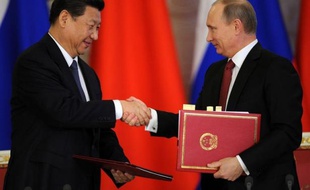 Le président russe Vladimir Poutine et son homologue chinois Xi Jinping ont affiché des relations au beau fixe entre les deux pays qui ont conclu d'importants accords dans le pétrole et le gaz pour le premier déplacement à l'étranger du nouveau chef de l'Etat chinois.