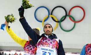 Le biathlète français Martin Fourcade, lors de sa victoire sur l'individuelle des JO de Sotchi, le 13 février 2014