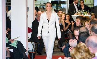 Justine Hénin a défilé pour la collection du couturier Carlo & Fils, le 19 mars 2009.