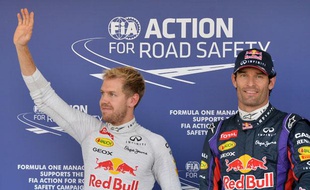 L'Allemand Sebastian Vettel et son coéquipier chez Redbull Mark Webber, le 12 octobre 2013 à Suzuka.