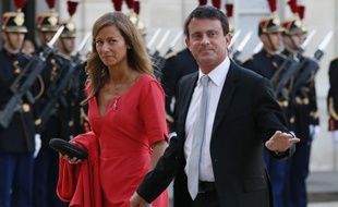 Le ministre de l'Intérieur Manuel Valls et son épouse Anne Gravoin au palais de l'Elysée le 3 septembre 2013