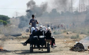 Scène d'affrontement entre Gazaouis et force de sécurité israéliennes au point de passage de Nahal Oz, le 10 octobre 2015