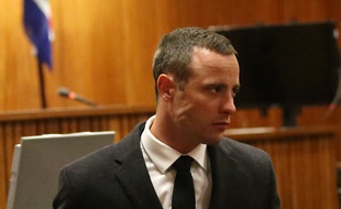 Le champion paralympique Oscar Pistorius lors de son procès pour meurtre, le 20 mai 2014 à Pretoria.
