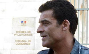 Xavier Mathieu, ex-leader de la CGT chez Continental, le 30 août 2013 à la sortie du tribunal de Commerce de Compiègne