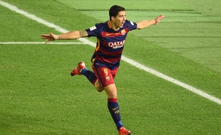 Barcelona forward Luis Suarez celebrates his goal against River Plate during the Club World Cup football final in Yokohama on December 20, 2015. AFP PHOTO / TORU YAMANAKA / AFP / TORU YAMANAKA