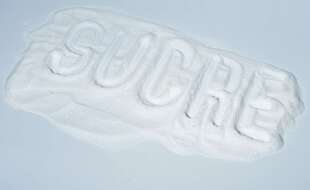 Du sucre en poudre (illustration).
