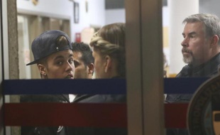 Justin Bieber à son arrivée au commissariat de police de Toronto, au Canada, mercredi 29 janvier 2014.