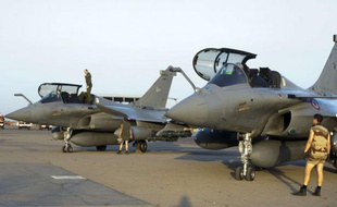 This Sunday Jan.13, 2013 photo provided by the French Army Monday Jan.14, 2013 shows French Rafale jetfighters on the tarmac after a mission to Mali in N'Djamena, Chad. French fighter jets bombed rebel targets in a major city in Mali's north Sunday, pounding the airport as well as training camps, warehouses and buildings used by the al-Qaida-linked Islamists controlling the area, officials and residents said. (AP Photo/Adj Nicolas-Nelson Richard, ECPAD)/