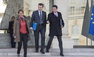 Les ministres de l'Environnement et de l'Economie Ségolène Royal et Emmanuel Macron et le Premier ministre Manuel Valls en février 2015.