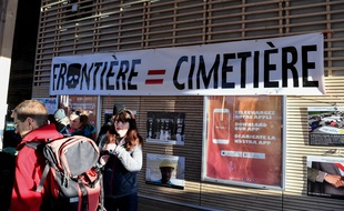 (FILES) In this file photo taken on March 15, 2019 Activists from different associations gather next to a banner reading