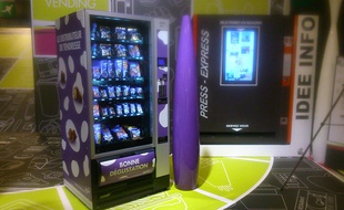 Illustration d'un distributeur Milka présenté au salon Vending, qui détaille les innovations de la distribution automatique.