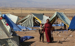 Réfugiés de la communauté yazidie en Syrie le 12 août 2014.