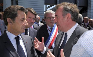 L'ancien président de la République Nicolas Sarkozy et le président du Modem François Bayrou à Bordes, Pyrénées-Atlantiques, le 22 juin 2010