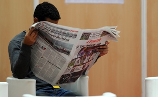 Un lecteur du journal «L'Equipe».