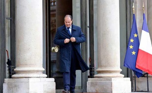 Le député PS Jean-Christophe Cambadelis quitte l'Elysée le 18 septembre 2013 à Paris.