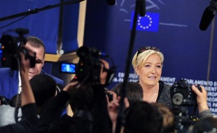 Marine Le Pen arrive au Parlement européen à Bruxelles pour une conférence de presse, le 28 mai 2014