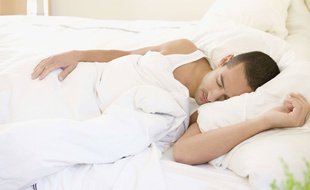 Illustration d'un homme en train de dormir.