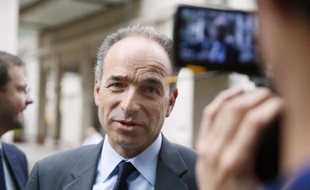Jean-Francois Copé à son arrivée au siège de l'UMP le 30 mars 2014 à Paris