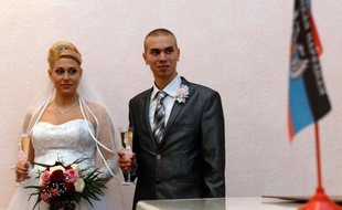 Ioulia et Dmitri Kolobov lors de leur mariage le 27 décembre 2014 à Donetsk