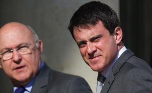 Manuel Valls, ministre de l'Intérieur et Michel Sapin, ministre du Travail, le 24 avril 2013