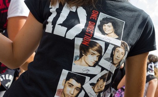 Une fan des One Direction, avant leur concert à Turin, en Italie, le 6 juillet 2014.