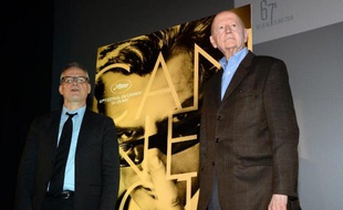 Le délégué général Thierry Frémeaux (g) et le président du Festival Gilles Jacob présentent la sélection officielle du 67e festival de Cannes, le 17 avril 2014 à Paris