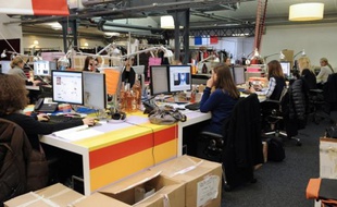 Des personnes travaillent dans les bureaux de la société «vente-privee.com», le 14 janvier 2010 dans son bureau à la Plaine Saint-Denis.