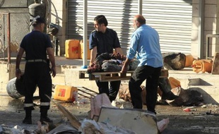 Le corps d'un Palestinien tué le 23 septembre 2014 à Hbron est emmené sur un brancars