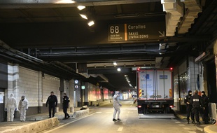 Des enquêteurs sur les lieux, à La Défense, le 13 décembre dernier.