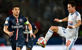 Le défenseur du PSG Thiago Silva et le joueur de l'OM Florian Thauvin, le 9 novembre 2014, au Parc des Princes.