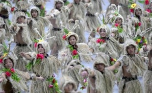 Des spectacles de danse en costumes de toutes les provinces chinoises lors de la cérémonie d'ouverture des jeux Olympiques, de 2012, à Pékin (Photo illustration).