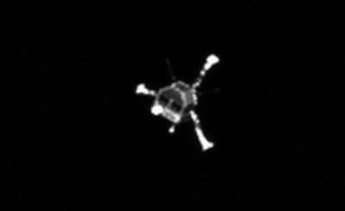 FILE -This image from Rosettaís OSIRIS narrow-angle camera, released by the European Space Agency ESA on Nov. 13, 2014 shows the Philae lander on Nov. 12, 2014 Philae landed Nov. 12, next to a cliff that largely blocked sunlight from reaching its solar panels on the 4-kilometer-wide (2.5-mile-wide) 67P/Churyumov-Gerasimenko comet. The head of the European comet mission says scientists will listen for signals from the Philae lander Saturday Nov. 15, 2014 but think it is unlikely they will establish any kind of communication soon. Controllers at the European Space Agency on Friday ordered the lander to perform a maneuver intended to pull it out of a shadow on the comet so that solar panels could recharge the depleted batteries. ìWe donít know if the charge will ever be high enough to operate the lander again,î Paolo Ferri, ESAís head of mission operations, told The Associated Press. (AP Photo/ESA,File)/XROS104/909920707979/FILE - AP PROVIDES ACCESS TO THIS HANDOUT PHOTO TO BE USED SOLELY TO ILLUSTRATE NEWS REPORTING OR COMMENTARY ON THE FACTS OR EVENTS DEPICTED IN THIS IMAGE. THIS IMAGE MAY ONLY BE USED FOR 14 DAYS FROM TIME OF TRANSMISSION; NO ARCHIVING; NO LICENSING./1411151216